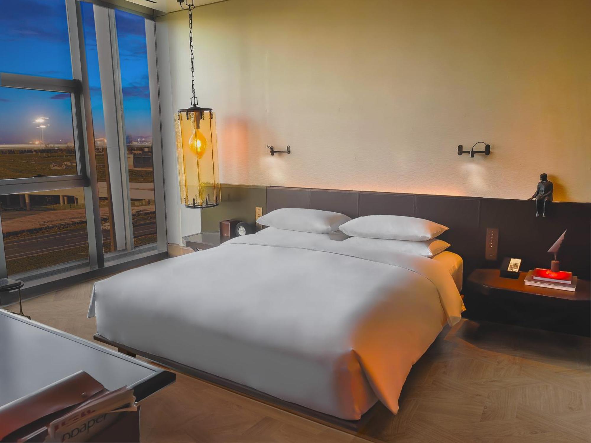 Mumian Beijing Daxing International Airport, Part Of Hyatt Hotel Kültér fotó A bedroom at the hotel